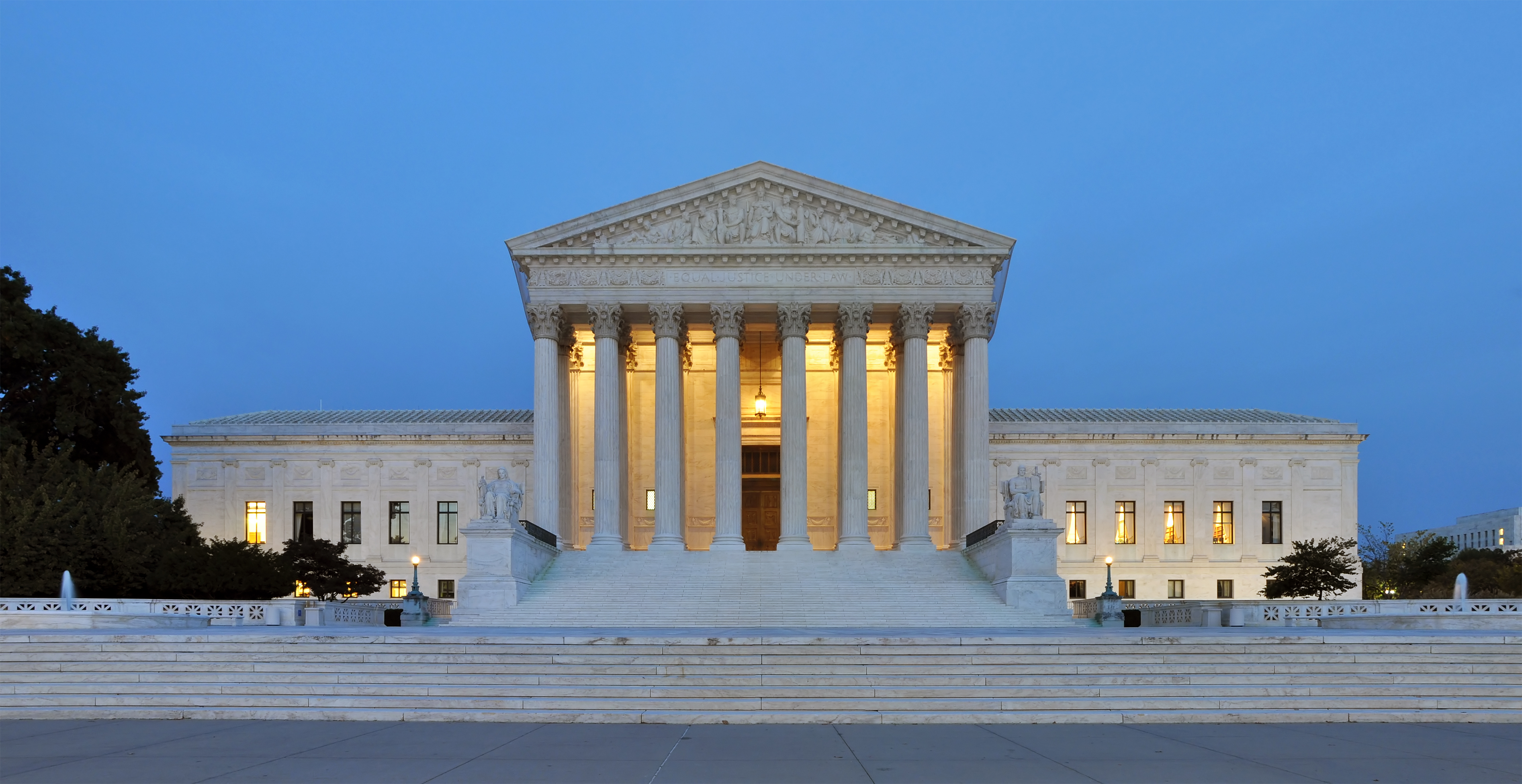 The U.S. Supreme Court building at dusk