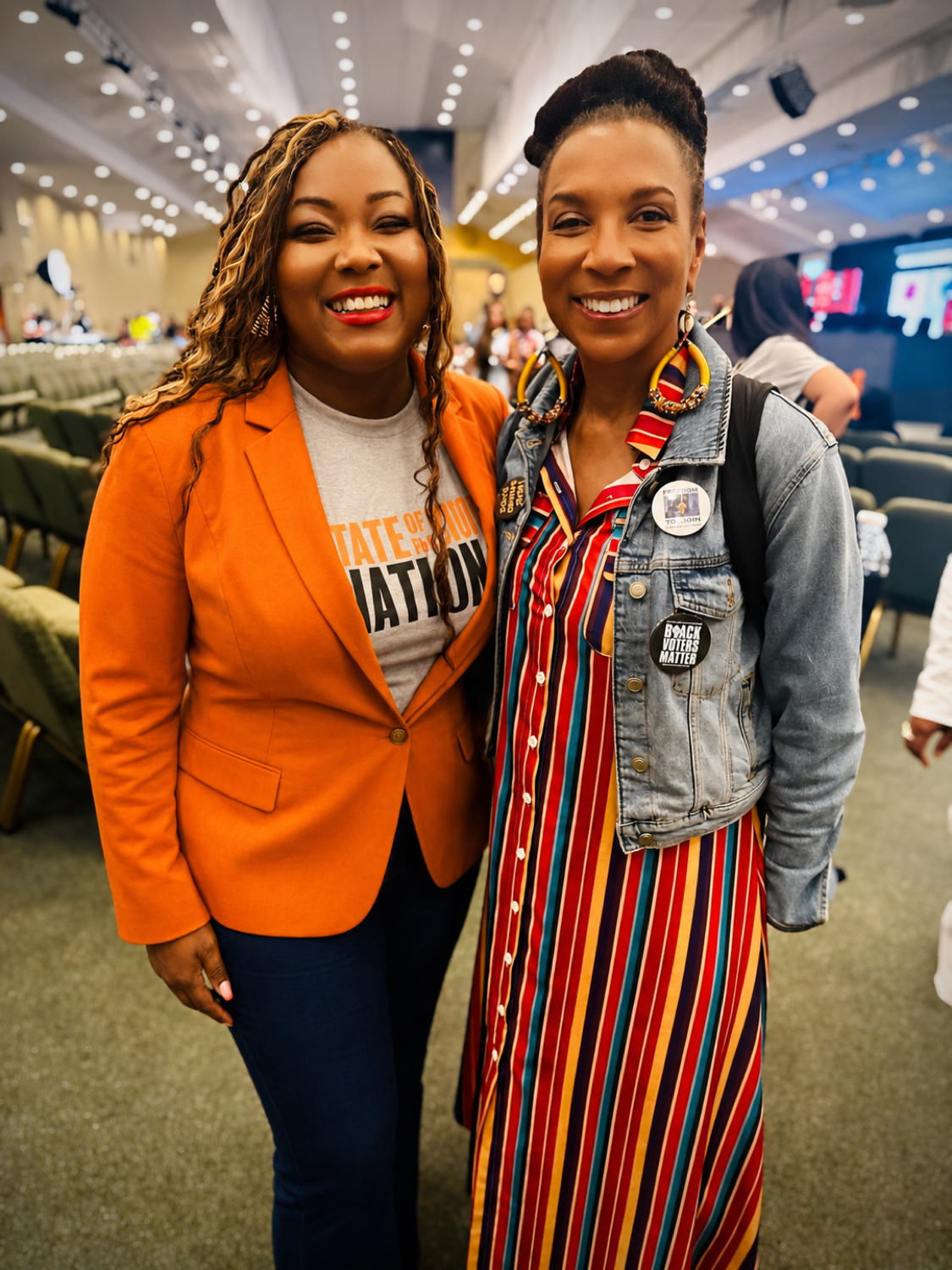 Hannah Naomi Jones, event orange blazer